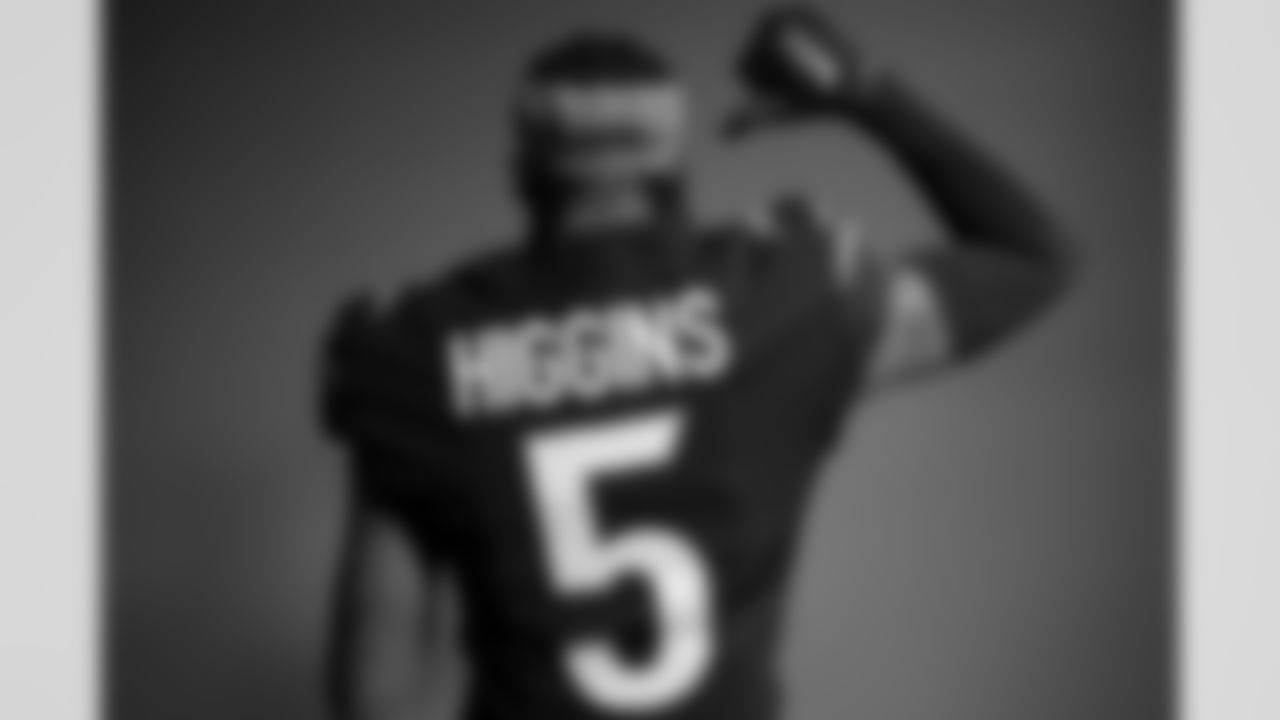 Bengals WR Tee Higgins shows his new #5 jersey for the upcoming 2023 NFL Season.