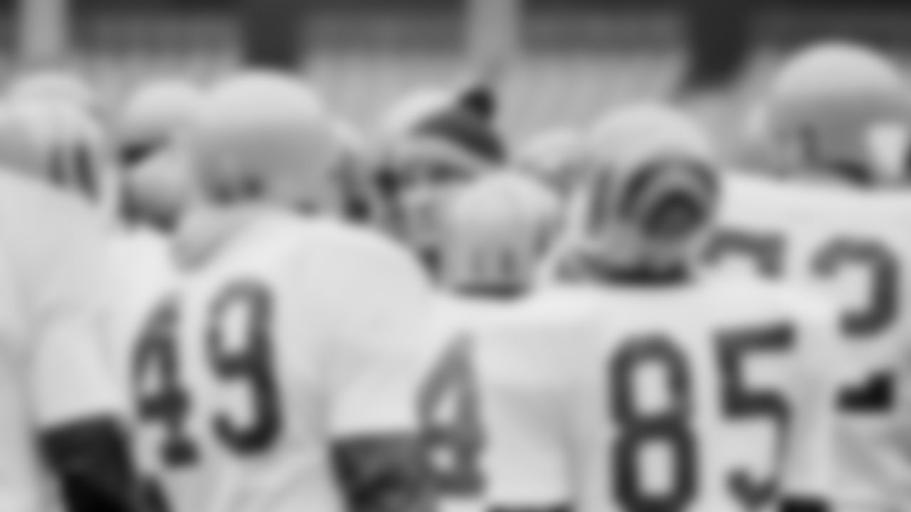 Cincinnati Bengals head coach Forrest Gregg has a look of concern as he talks with his players during a practice session at Riverfront Stadium in Cincinnati, Jan. 2, 1982. The Bengals are preparing for a playoff game against the Buffalo Bills in Cincinnati. (AP Photo)