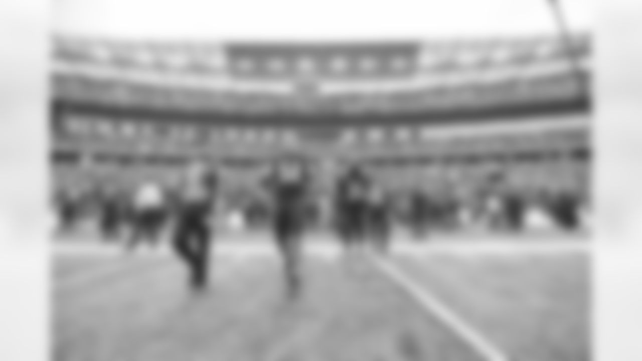 DE Sam Hubbard (left) and S Michael Thomas walk out for the coin toss before kickoff of Week 18 against the Baltimore Ravens at Paycor Stadium in Cincinnati, Ohio on Sunday, January 8 2023.