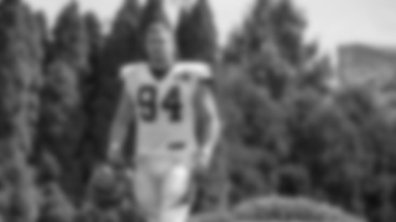 DE Sam Hubbard walks to practice.