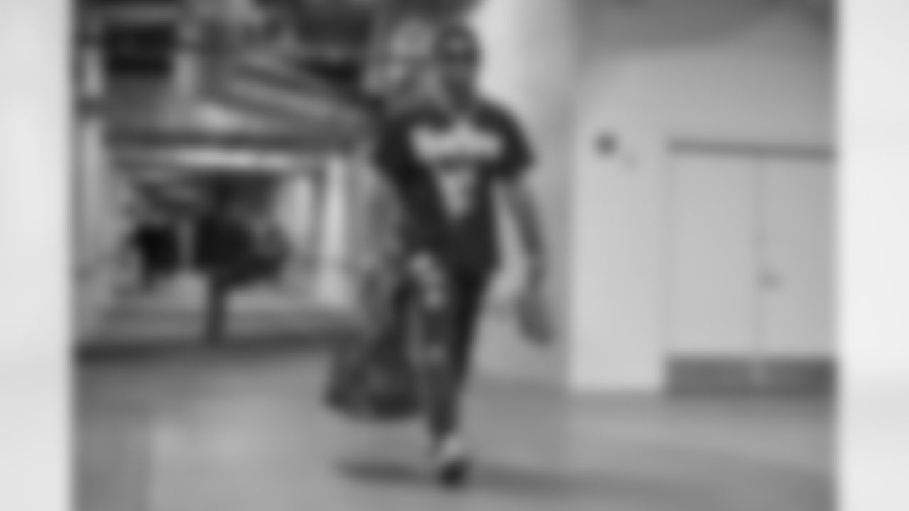 CB Cam Taylor-Britt walks to the visitors locker room at Nissan Stadium before Week 12 against the Tennessee Titans in Nashville, Tennessee.