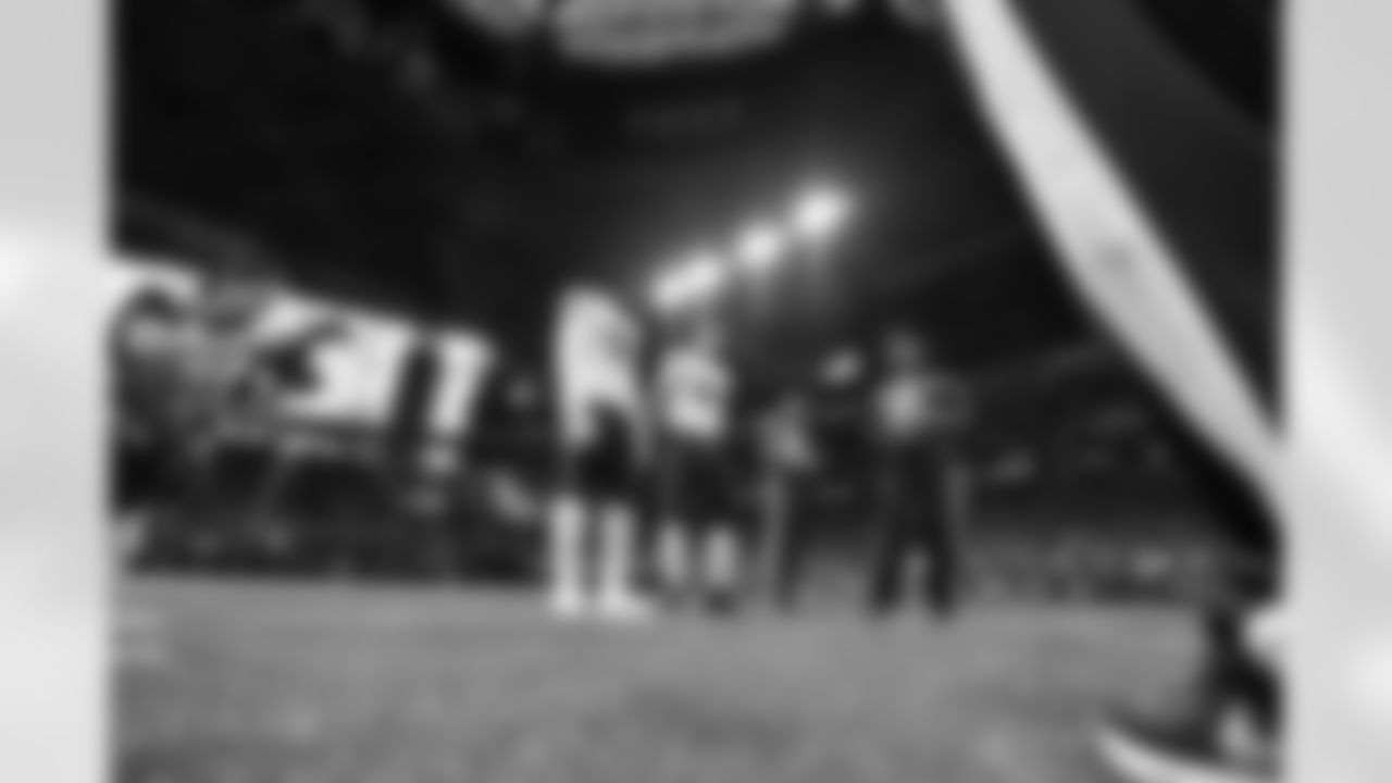 DE Cam Sample (left) and TE Drew Sample during the coin toss before kickoff of the Bengals-Falcons game in week 2 of the 2023 preseason.