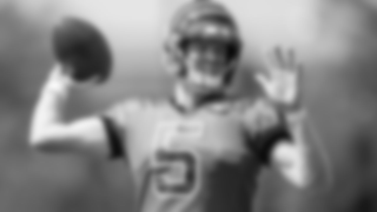 QB Ryan Finley throws during practice.