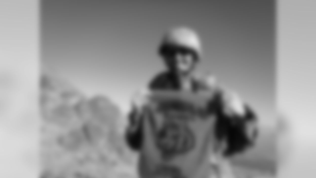 Here is a picture of me in the mountains of Afghanistan flying my Who Dey flag proudly. I am a season ticket holder and I already bought my tickets for the 2013 campaign, even though I will be here all season. I hope to make it back for a game while I'm on R and R this winter. Take care and Who Dey to all my friends back home. --Dave Reames, Lieutenant Commander, USN