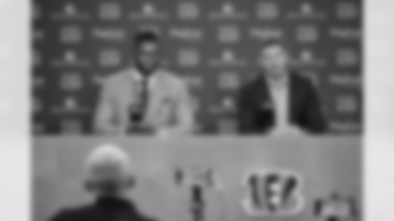 DE Myles Murphy (left) and Bengals head coach Zac Taylor speak to the media during Murphy's first visit to Paycor Stadium on Saturday, April 29 2023.