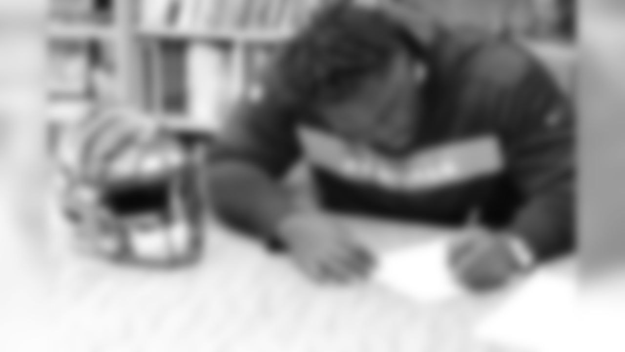 John Miller at Paul Brown Stadium signing his Bengals contract.