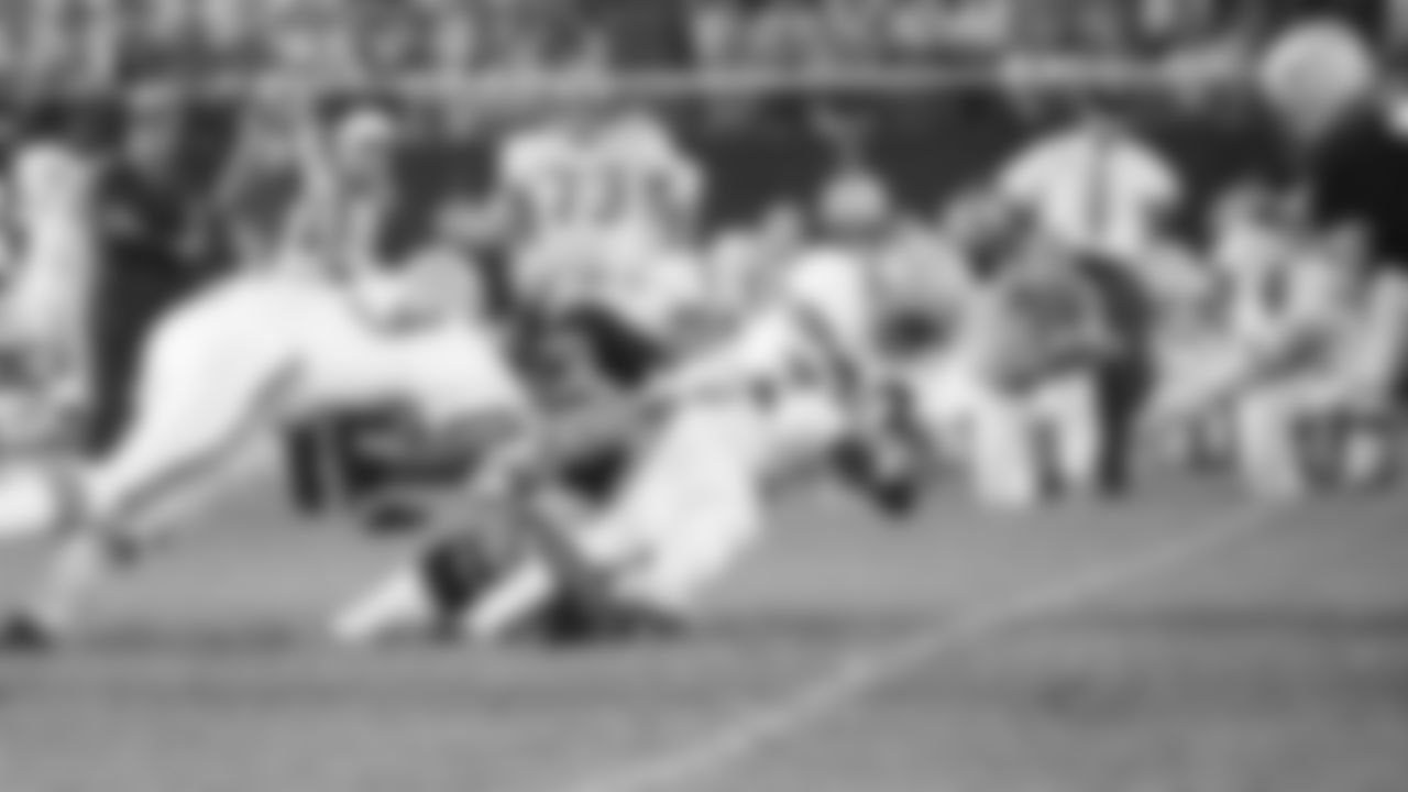 Bengals running back Jess Phillips rushes up field for a first down against the Green Bay Packers in 1971.