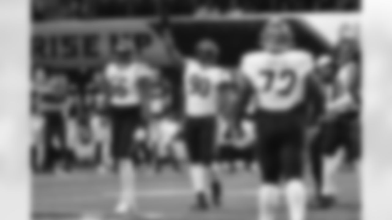 DE Owen Carney (right) celebrates during the Bengals-Falcons game in week 2 of the 2023 preseason.