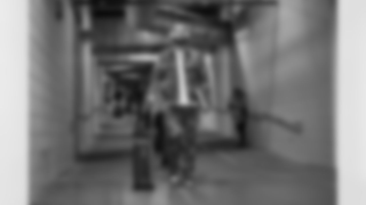 S Jessie Bates III walks to the visitors locker room at Nissan Stadium before Week 12 against the Tennessee Titans in Nashville, Tennessee.