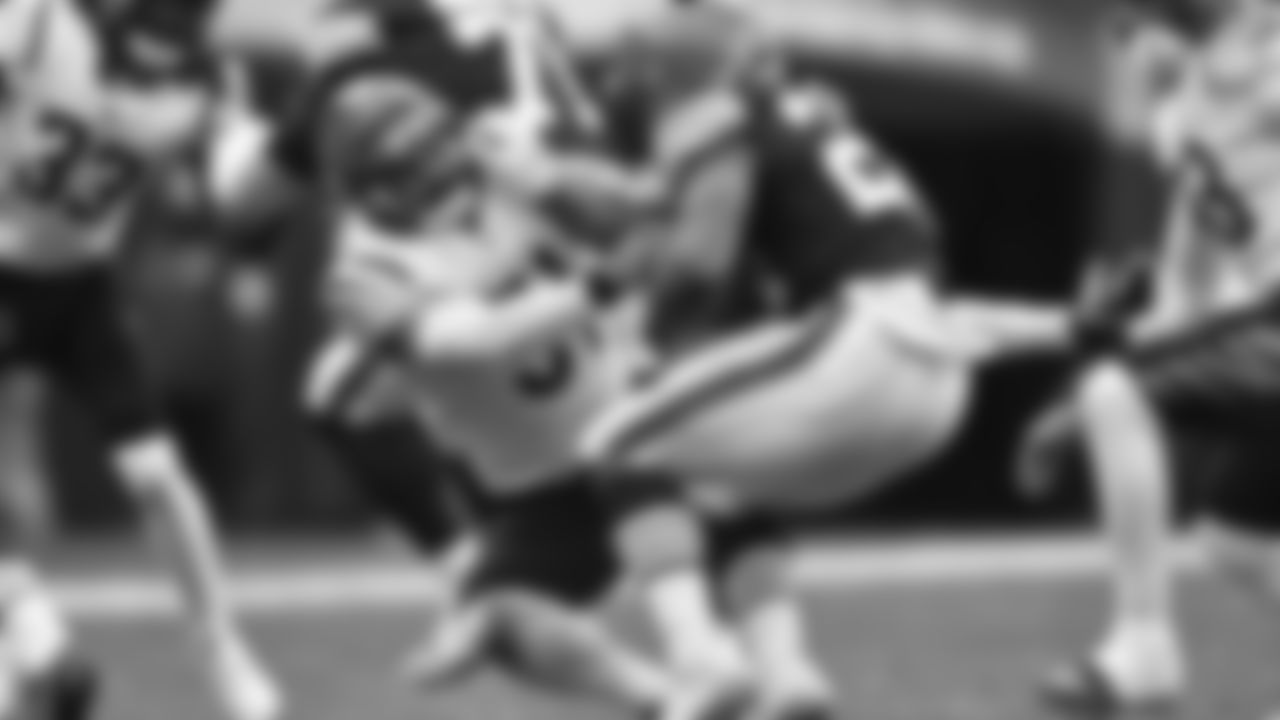 Linebacker Markus Bailey stops running back Nick Chubb for a five-yard loss in Week 18 against the Cleveland Browns.