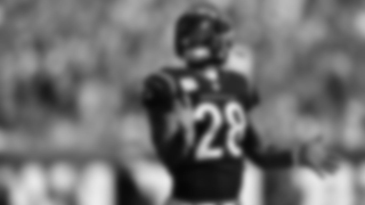 Running back Joe Mixon celebrates after scoring a rushing touchdown in the fourth quarter against the Green Bay Packers.