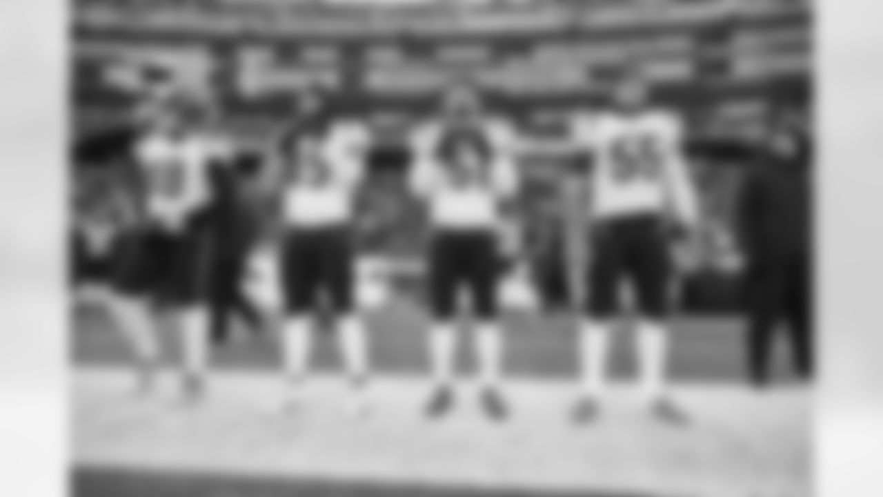 (Left to right) LS Cal Adomitis, LB Joe Bachie, LB Markus Bailey and LB Logan Wilson on the sidelines before kickoff of the Bengals-Patriots game on Saturday, December 24 2022 at Gillette Stadium in Foxborough, Massachusetts.