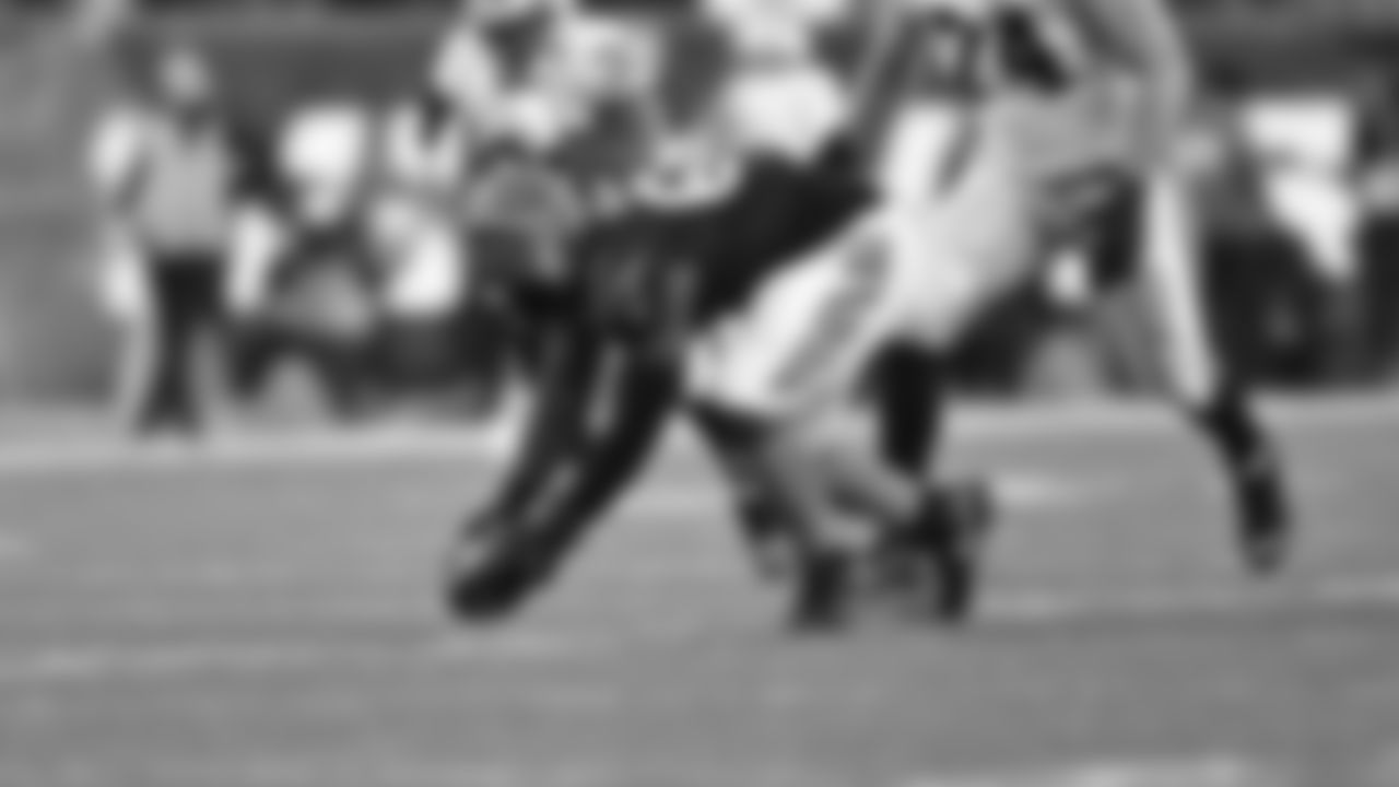 Defensive tackle Larry Ogunjobi recovers a fumble of Las Vegas Raiders quarterback Derek Carr in the AFC Wild Card game at Paul Brown Stadium in Cincinnati, Ohio.