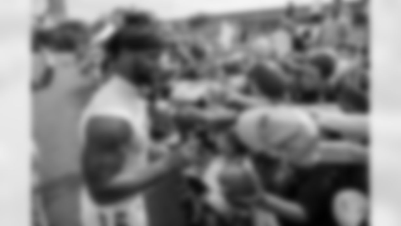 HB Joe Mixon signs autographs during day three of Bengals Training Camp at the Kettering Health Practice Fields on Friday, July 28, 2023 in Cincinnati, Ohio.