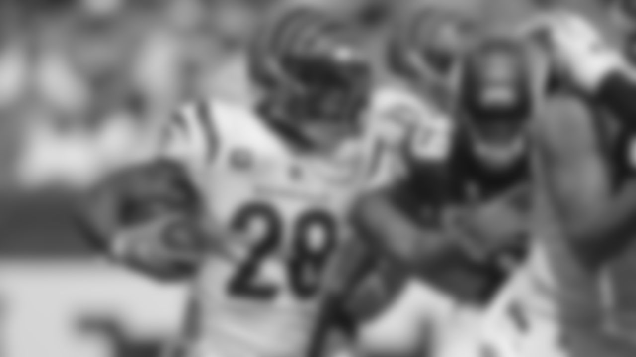 Cincinnati Bengals running back Joe Mixon (28) runs against the Minnesota Vikings during the second half of an NFL football game, Sunday, Sept. 12, 2021, in Cincinnati. (AP Photo/Aaron Doster)