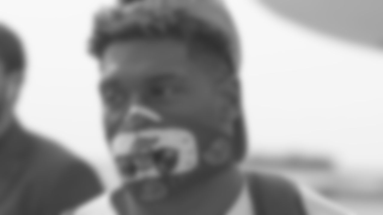 DE Carl Lawson travels with the team to Cleveland.
