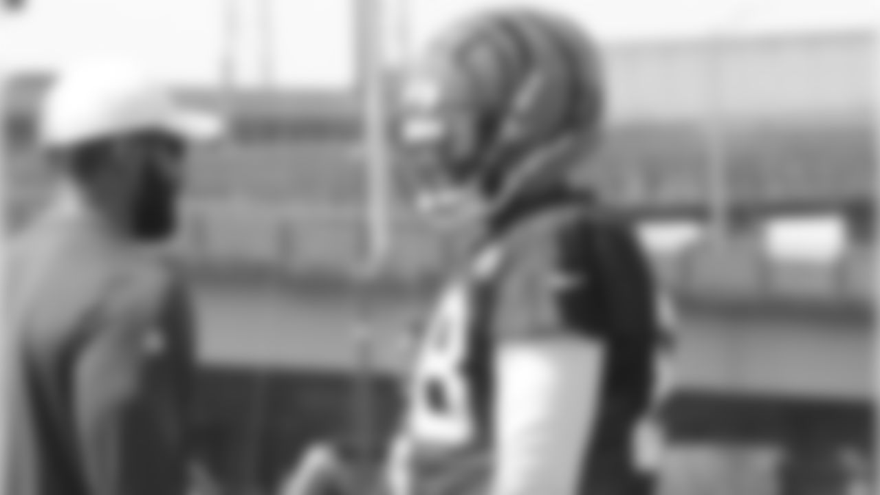 T Bobby Hart chatting during a break at practice.