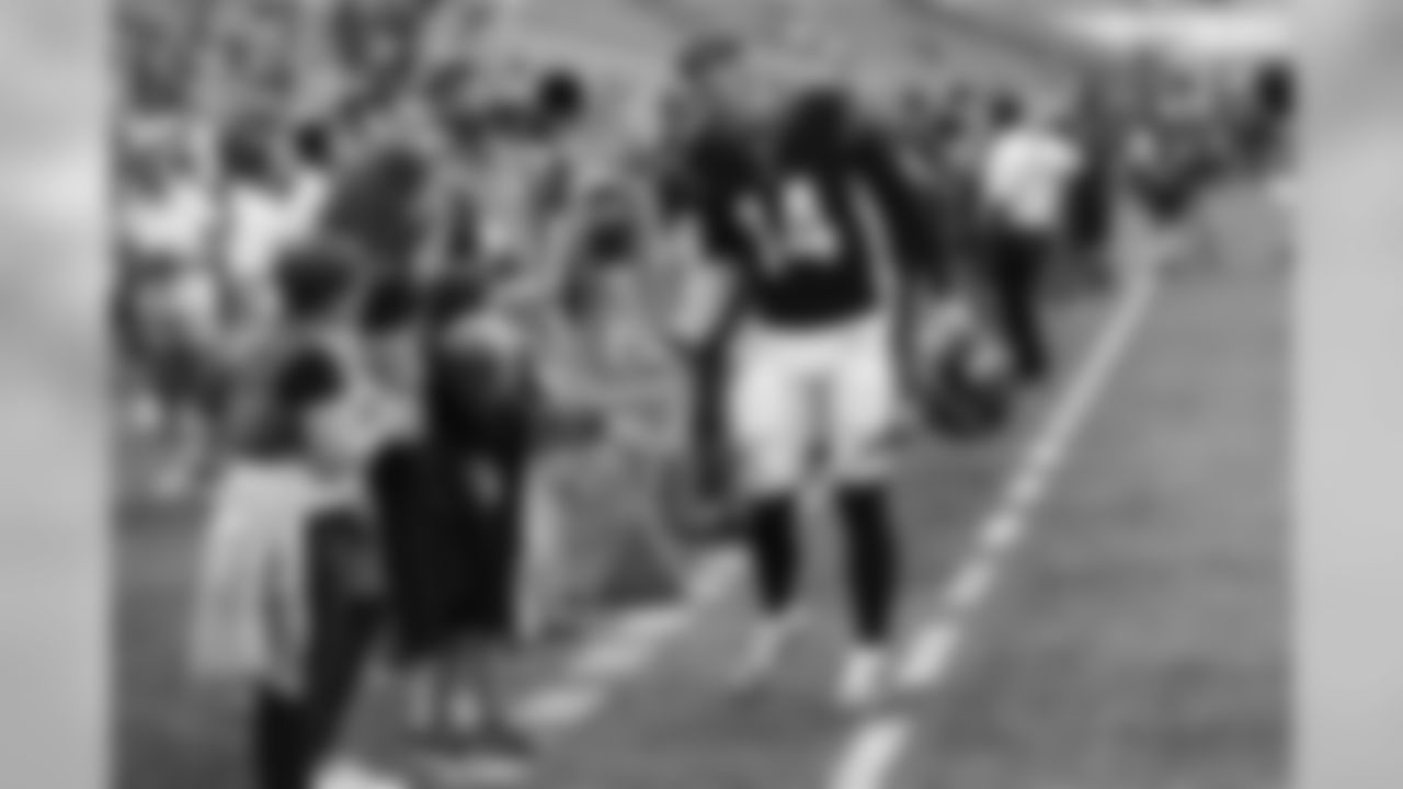Cincinnati Bengals quarterback Andy Dalton greets fans during practice before an NFL preseason football game, Thursday, Aug. 22, 2019, in Cincinnati. (AP Photo/Frank Victores)