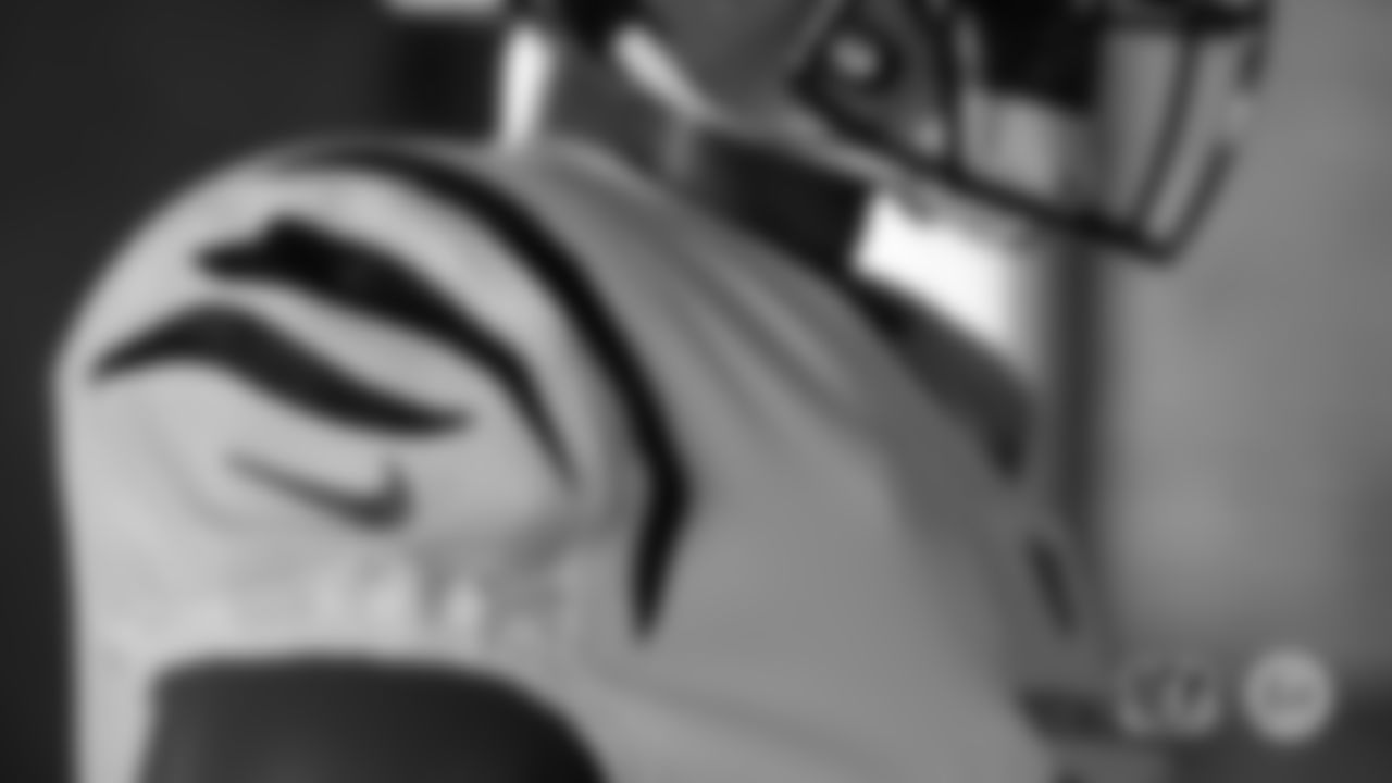 White jersey, right shoulder pad