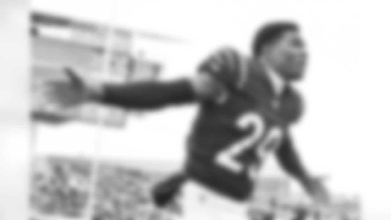 CB Cam Taylor-Britt runs to the field during warm ups before the Bengals faced the Cleveland Browns in Week 14 at Paycor Stadium in Cincinnati, Ohio.