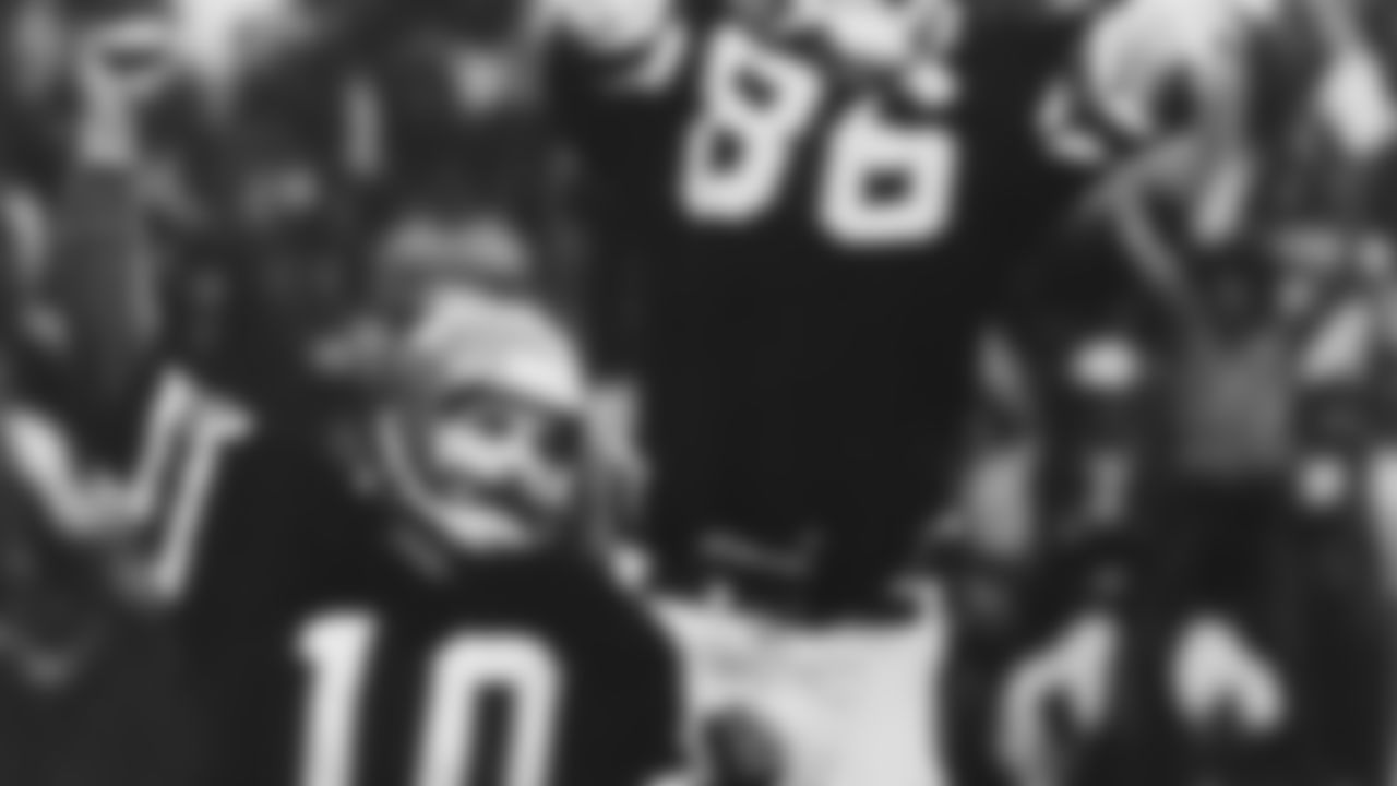 Cincinnati Bengals field goal kicker Jim Breech (10) and holder Steve Kreider (86) jump for joy after Breech booted a 21-yard field goal with 12 seconds left in the game to beat the Baltimore Colts 34-33 in Cincinnati on Dec. 7, 1980. (AP Photo/Jeff Hinckley)