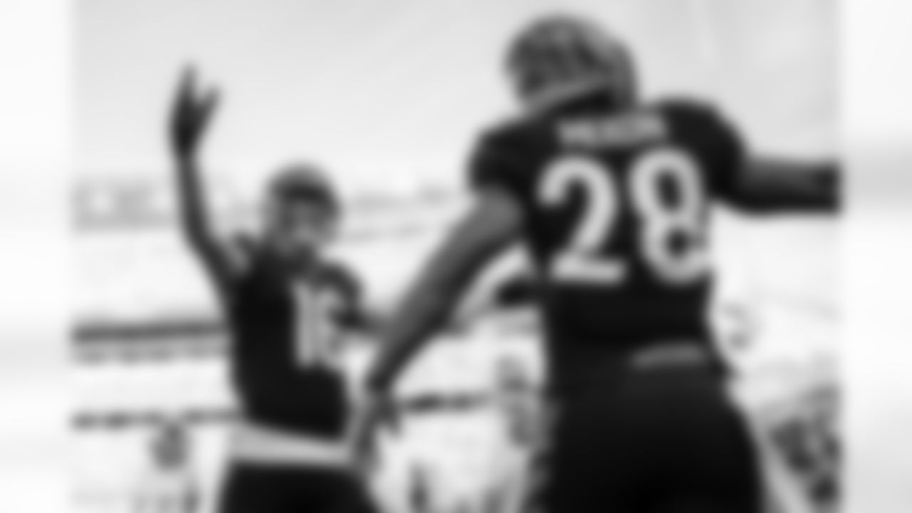 WR Trenton Irwin and HB Joe Mixon celebrate Mixon's touchdown during the Bengals-Panthers game in Week 9 of the 2022 season at Paycor Stadium in Cincinnati Ohio.