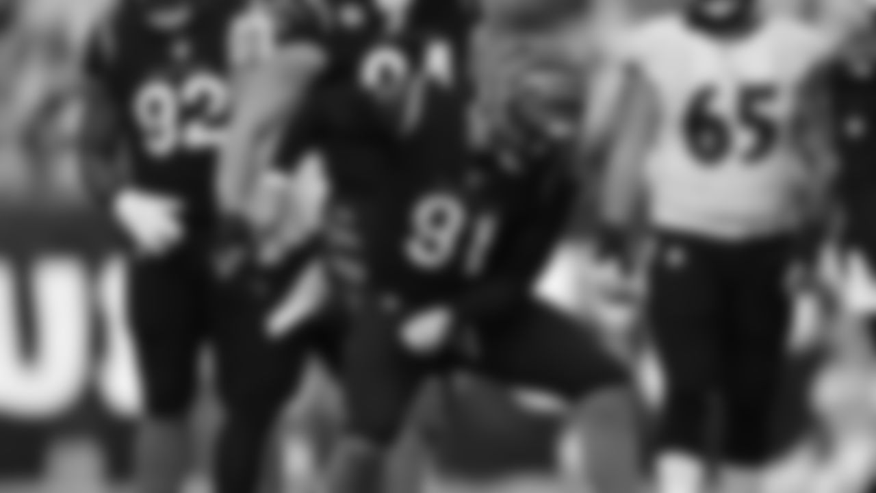 Defensive lineman Trey Hendrickson does the grave digger dance after tackling Ravens quarterback Josh Johnson for a loss.