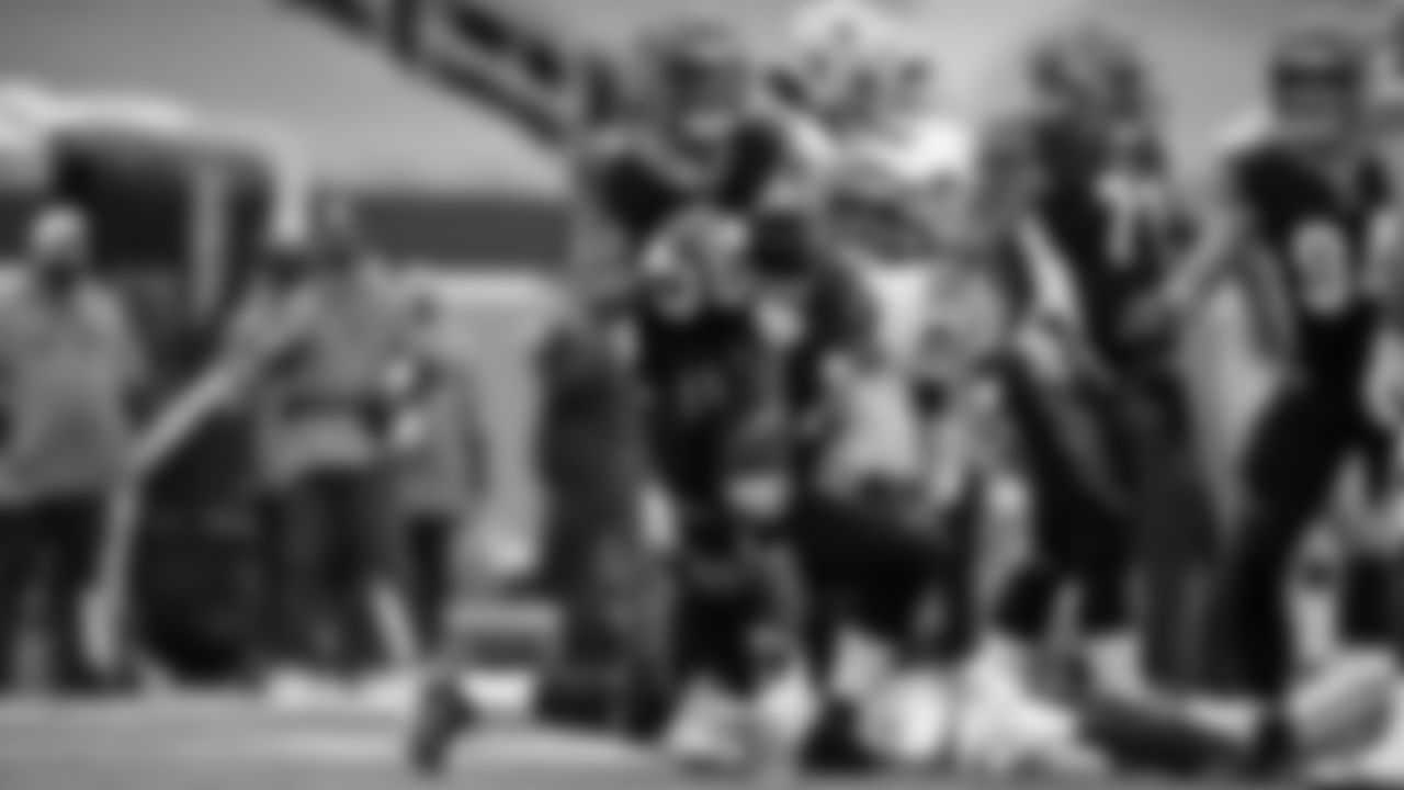 Safety Jessie Bates III celebrates after making a tackle in Week 14 against the Dallas Cowboys.