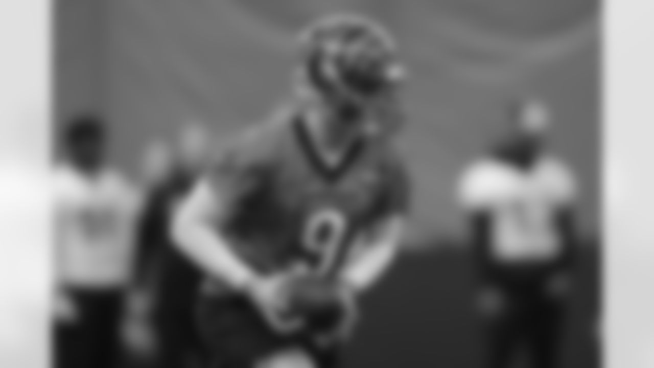 QB Joe Burrow runs the ball during practice on Friday, January 6 2023 at the IEL Practice Facility in Cincinnati, Ohio.