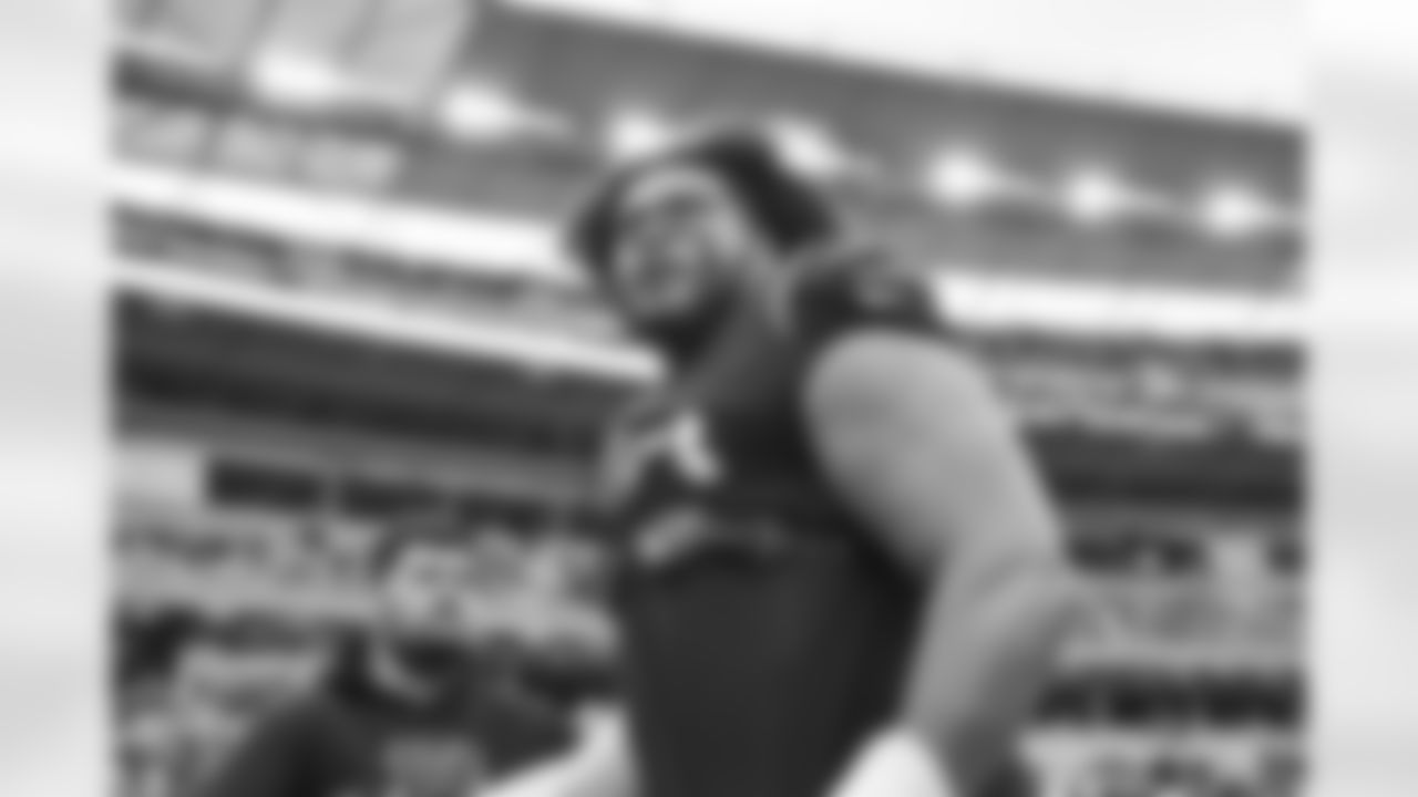 OT La'el Collins looks onto the field during warm ups before the Bengals faced the Cleveland Browns in Week 14 at Paycor Stadium in Cincinnati, Ohio.