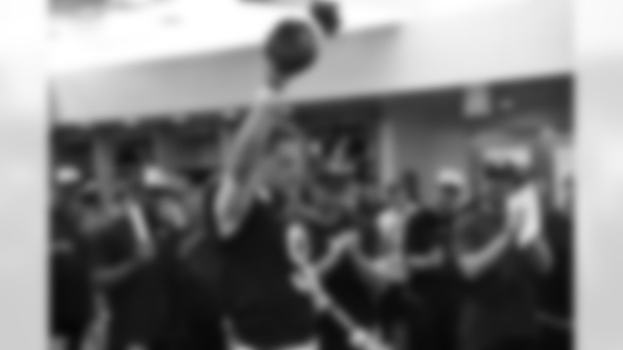 QB Joe Burrow receives a game ball in the locker room after the Bengals-Falcons Week 7 Game at Paycor Stadium on Sunday, October 23 2022.