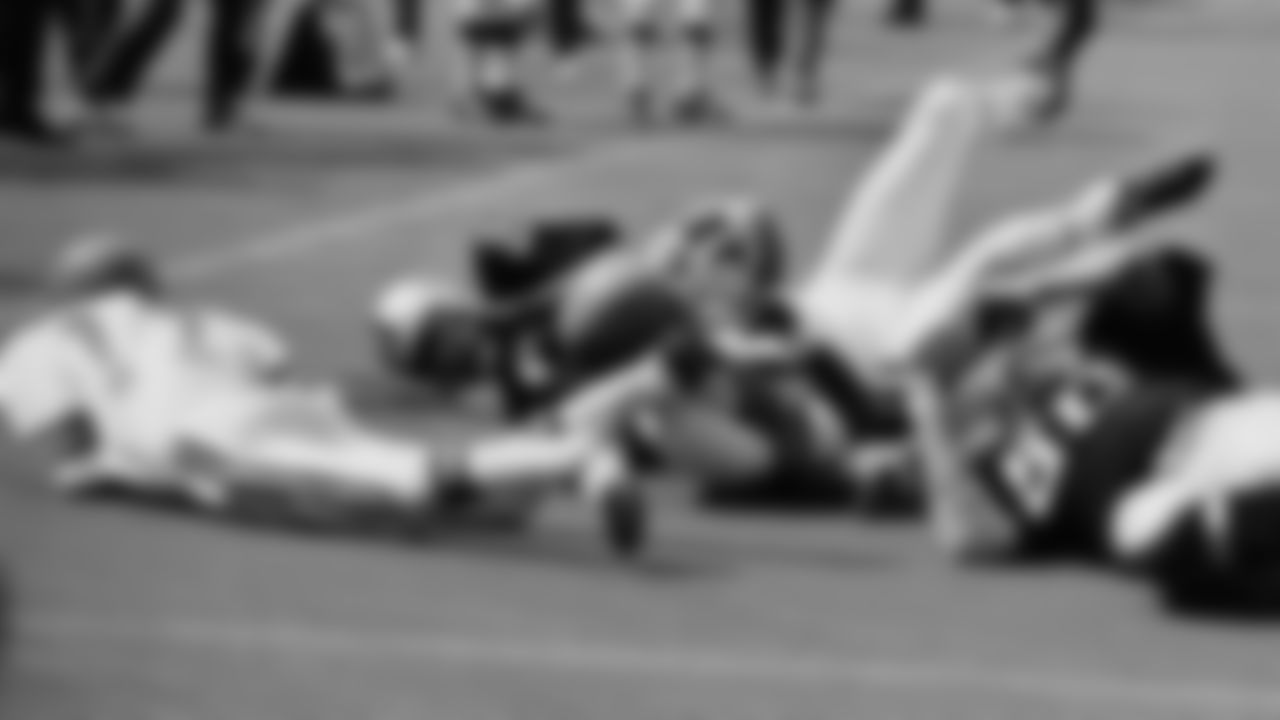 Cincinnati Bengals wide receiver Eric Crabtree (feet in air) grabbed a pass thrown by Quarterback Sam Wyche and raced to the Oakland Raiders three-yard line in second period of a NFL game here on Sunday, Sept. 21, 1970 in Cincinnati.