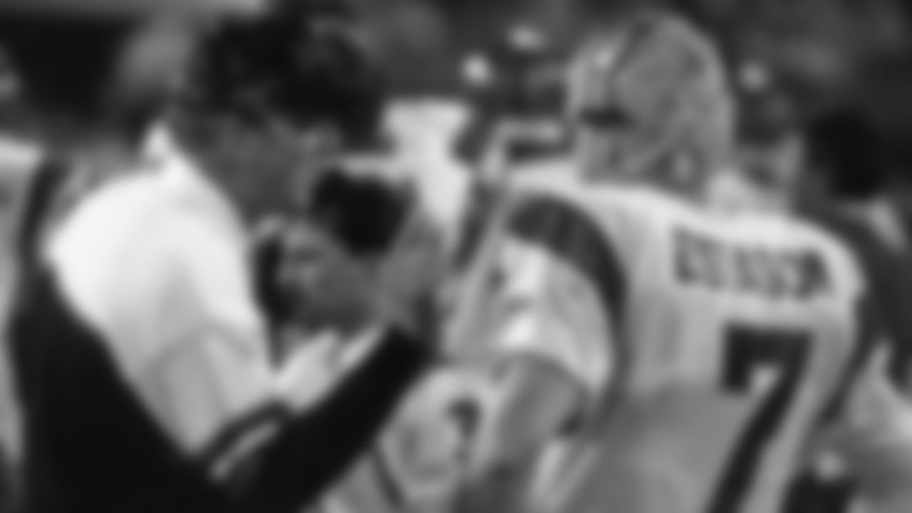 Bengals head coach Sam Wyche chats with quarterback Boomer Esiason during a timeout at Super Bowl XXIII in Tampa, Florida.