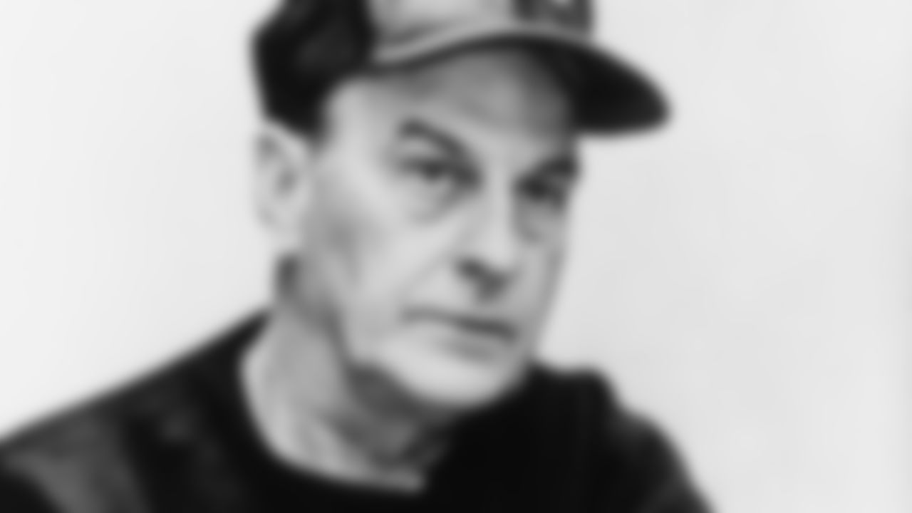 Cincinnati Bengals coach Paul Brown operates a movie projector beside which he spends many hours each week going over films of the Bengal's and their opponents. He was named the Associated Press Coach of the Year of the AFL in Cincinnati on Dec. 11, 1969. Brown, one of football's most successful coaches, is a stickler for fundamentals and precision. (AP Photo/Harvey Eugene Smith)