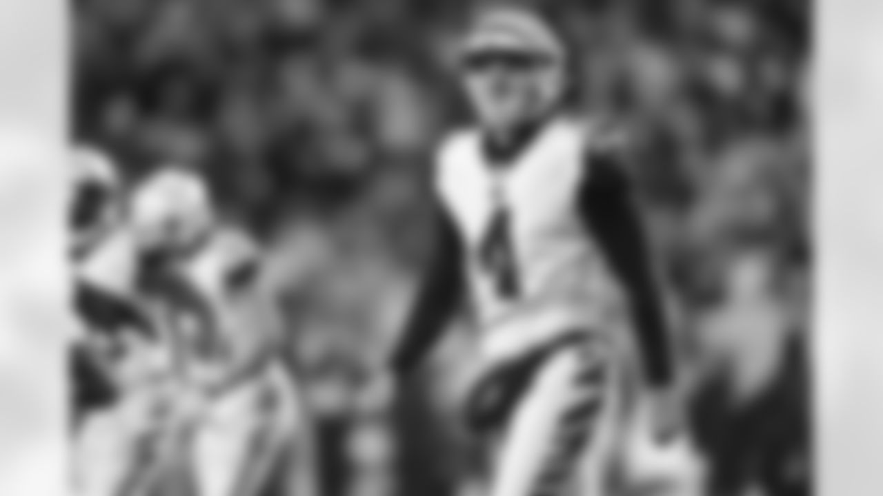 P Drue Chrisman walks off the field during his first career game in Week 11 of the 2022 season.