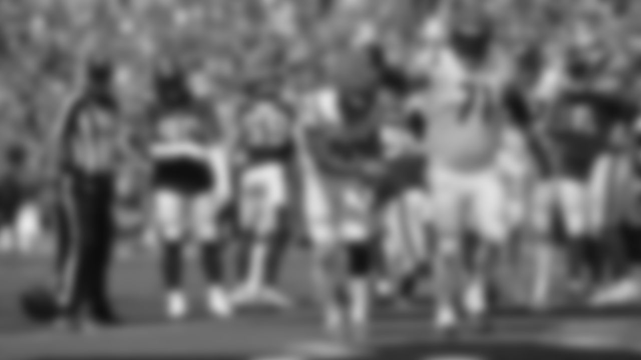 Running back Joe Mixon celebrates after scoring his first touchdown of the season in the second half against the Minnesota Vikings.
