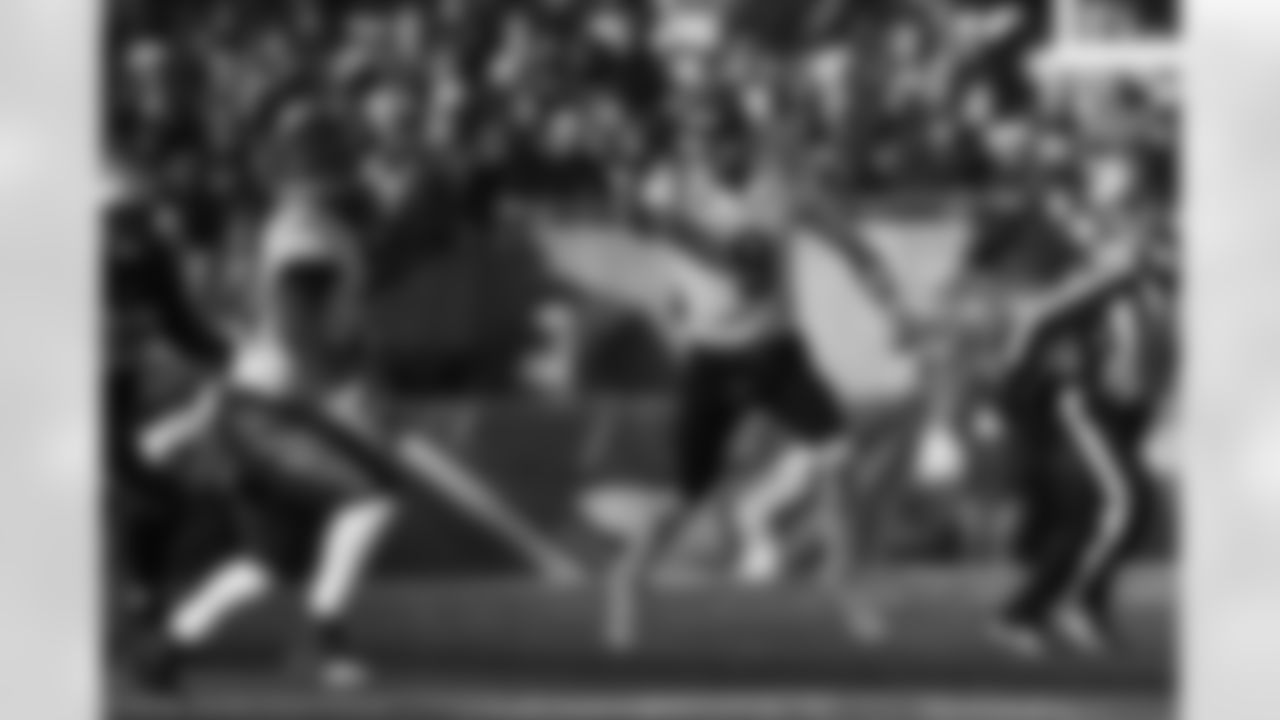 QB Joe Burrow runs the ball in the first quarter of the Bengals-Patriots game on Saturday, December 24 2022 at Gillette Stadium in Foxborough, Massachusetts.