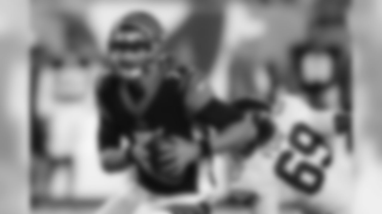 Cincinnati Bengals quarterback Jake Dolegala (7) runs the ball during the second half of the team's NFL preseason football game against the New York Giants, Thursday, Aug. 22, 2019, in Cincinnati. (AP Photo/Gary Landers)