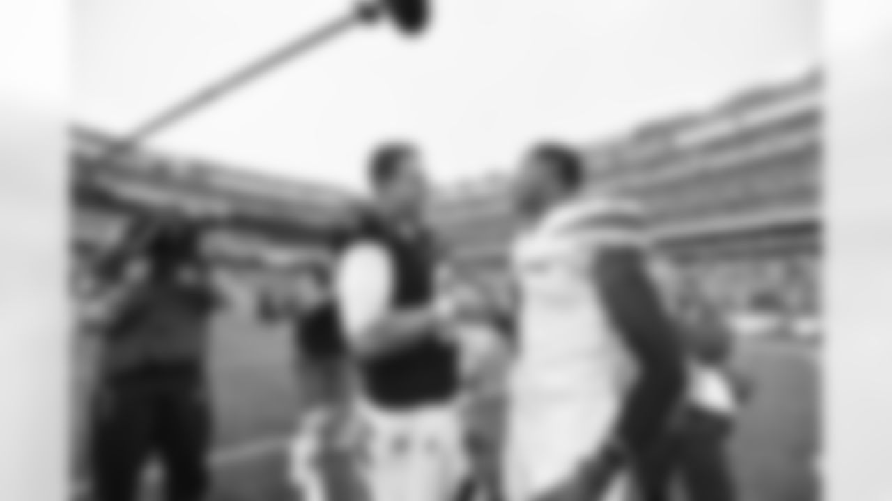 QB Joe Burrow with Jets CB Sauce Gardner