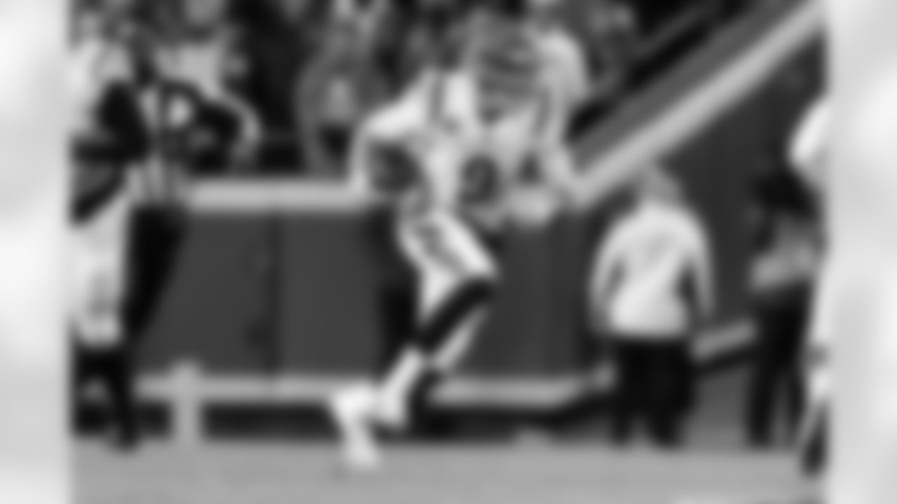 QB Joe Burrow runs the ball during the first quarter of the 2022 season AFC Championship against the Kansas City Chiefs on Sunday, January 29 2023.