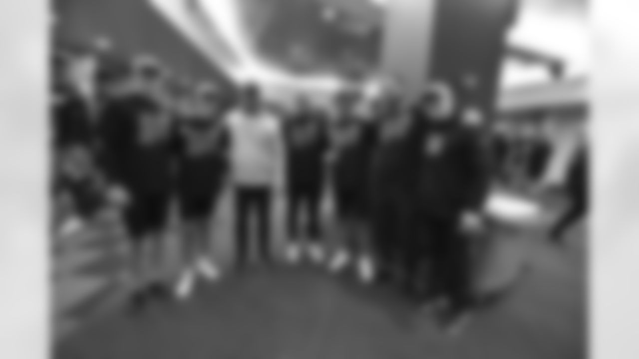 Bengals special teams pose for a photo as the team celebrates winning the AFC North in the Bengals locker room at Paycor Stadium on Sunday, January 8 2023.