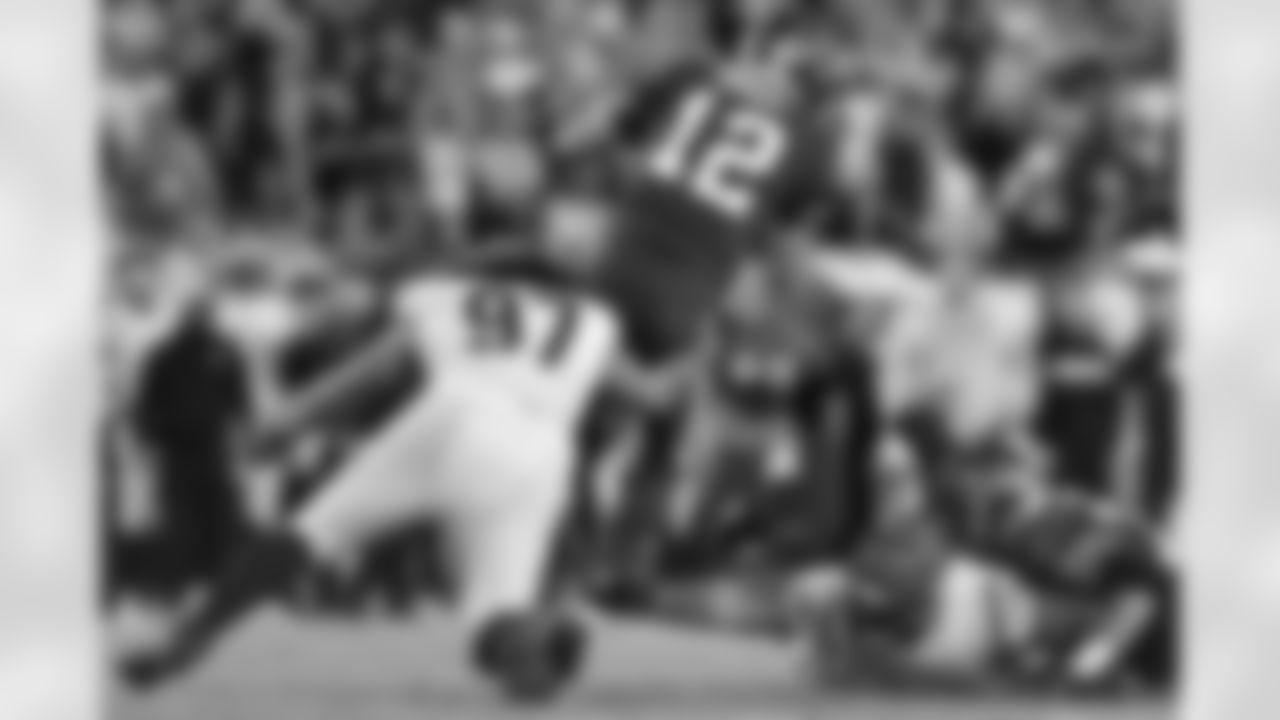 DT Jay Tufele tackles QB Tom Brady in the fourth quarter of the Bengals-Buccaneers game in Week 15 at Raymond James Stadium in Tampa Bay, Florida on Sunday, December 18 2022.