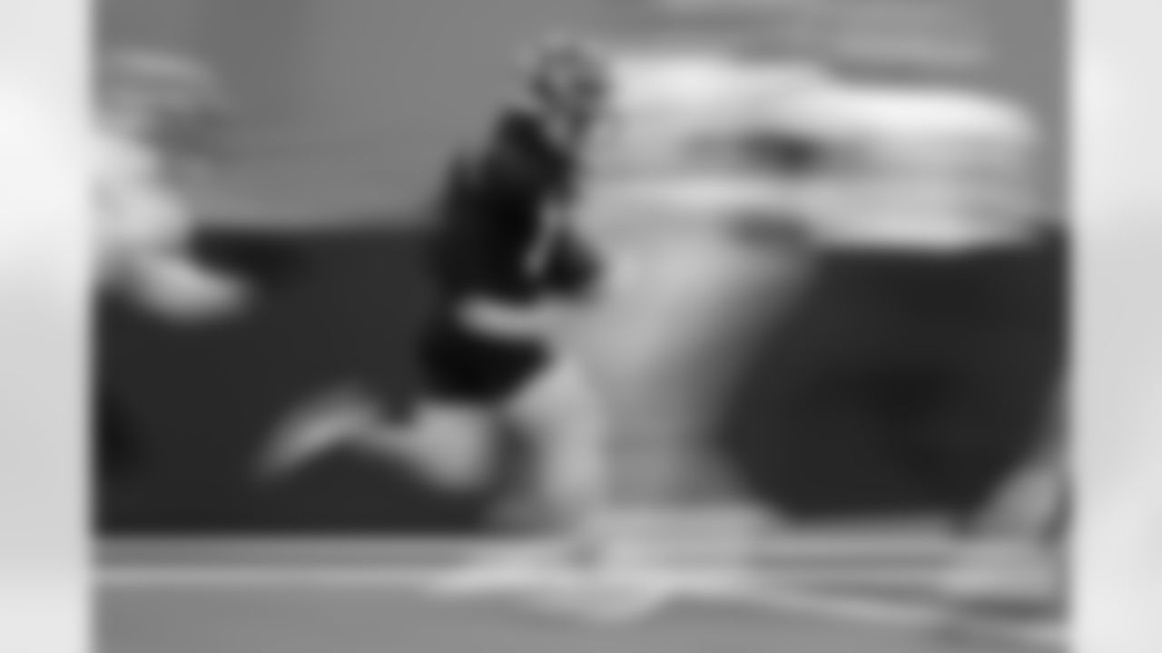 WR Trent Taylor runs the ball during practice at the IEL indoor Practice Facility in Cincinnati, Ohio on Friday, January 13 2023.