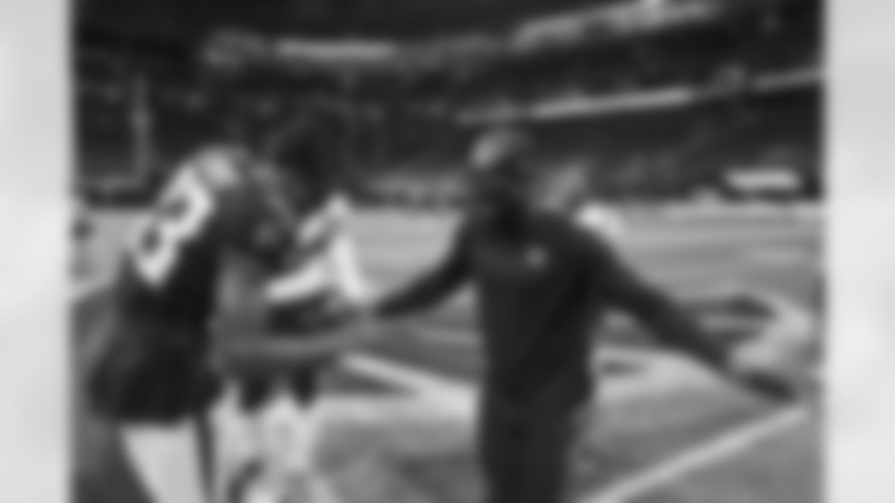 CB Tre Flowers greets S Michael Thomas after the Bengals-Falcons game in week 2 of the 2023 preseason.