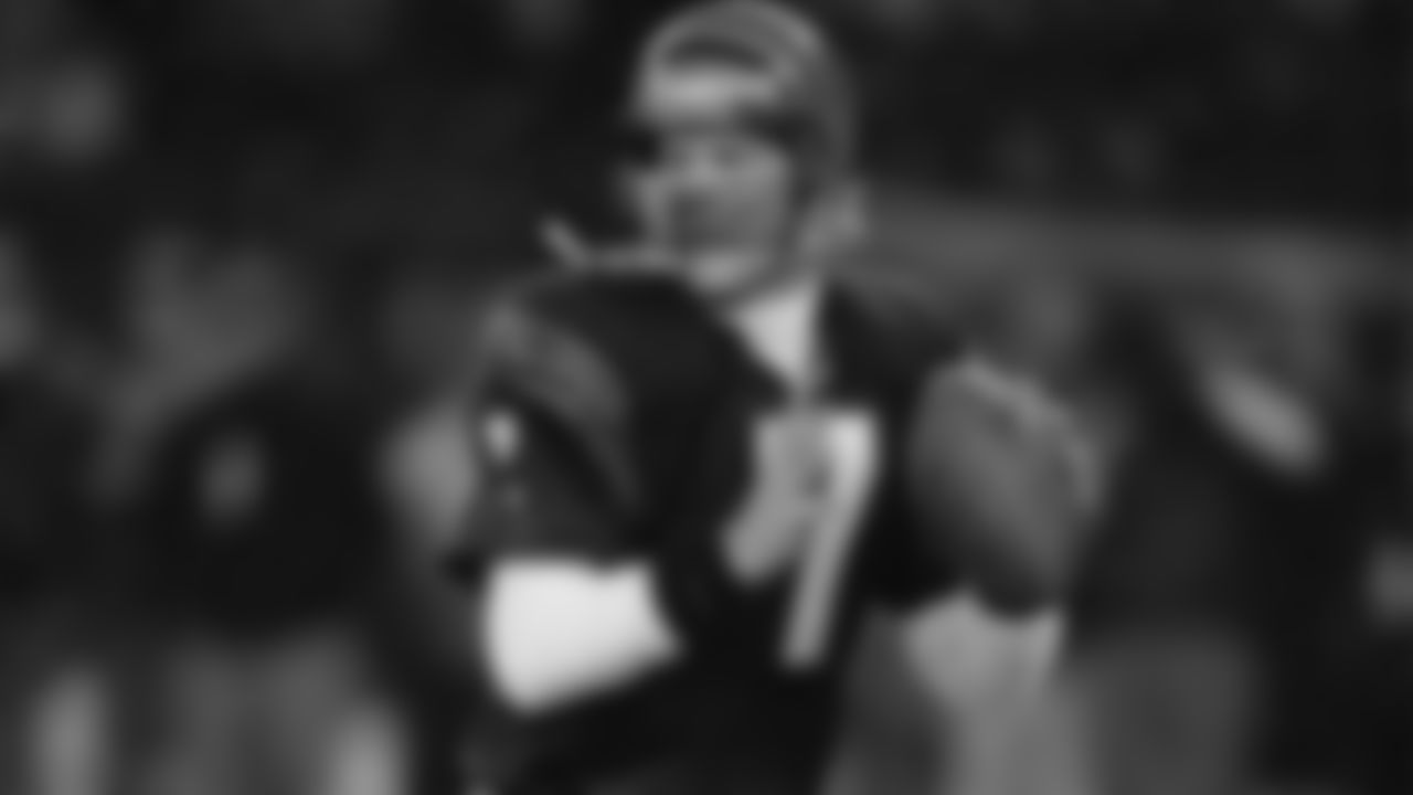 1986: Quarterback Boomer Esiason in action.