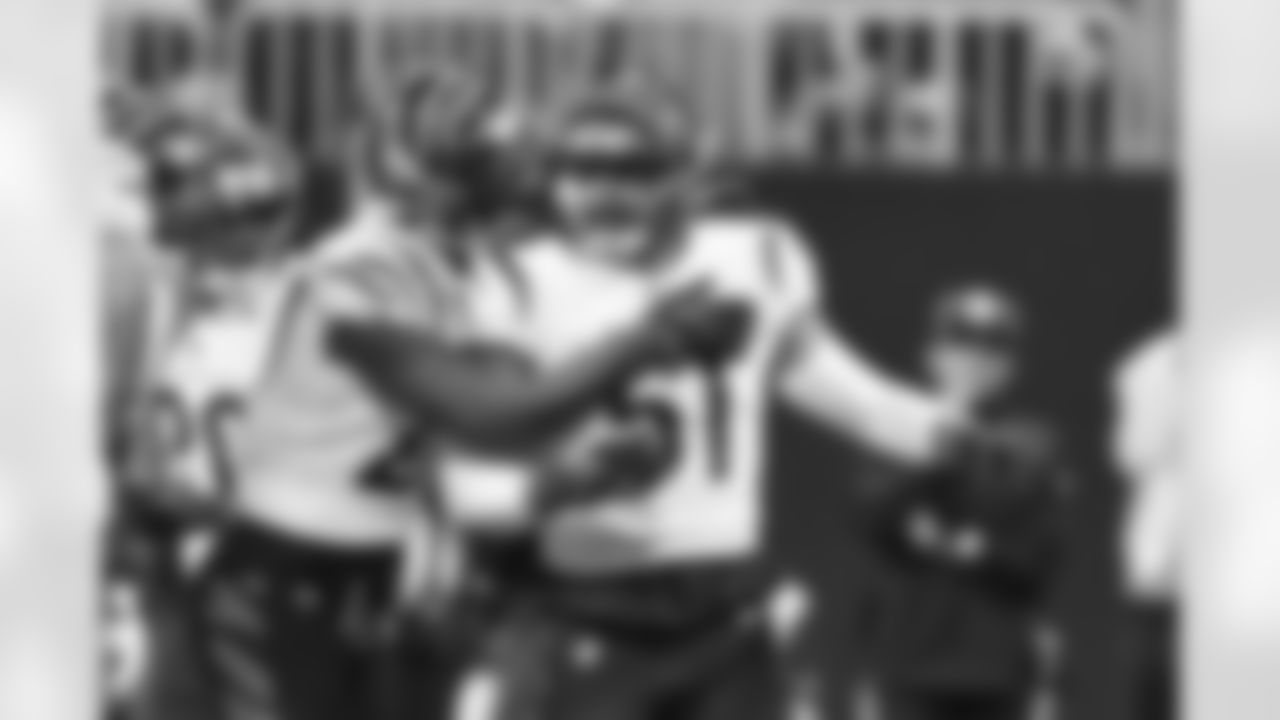 S Jordan Battle talks to LB Markus Bailey during the Bengals-Falcons game in week 2 of the 2023 preseason.