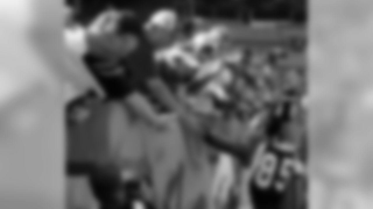 Cincinnati Bengals wide receiver Chad Johnson (85) shakes hands with Bengals' fans after Cincinnati's 27-13 win over the Cleveland Browns Sunday, Sept. 11, 2005, in Cleveland. (AP Photo/Mark Duncan)