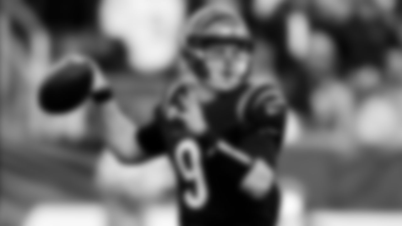 Cincinnati Bengals quarterback Joe Burrow (9) throws a pass in the second half during an NFL football game against the Baltimore Ravens, Sunday, Dec. 26, 2021, in Cincinnati. (AP Photo/Emilee Chinn)