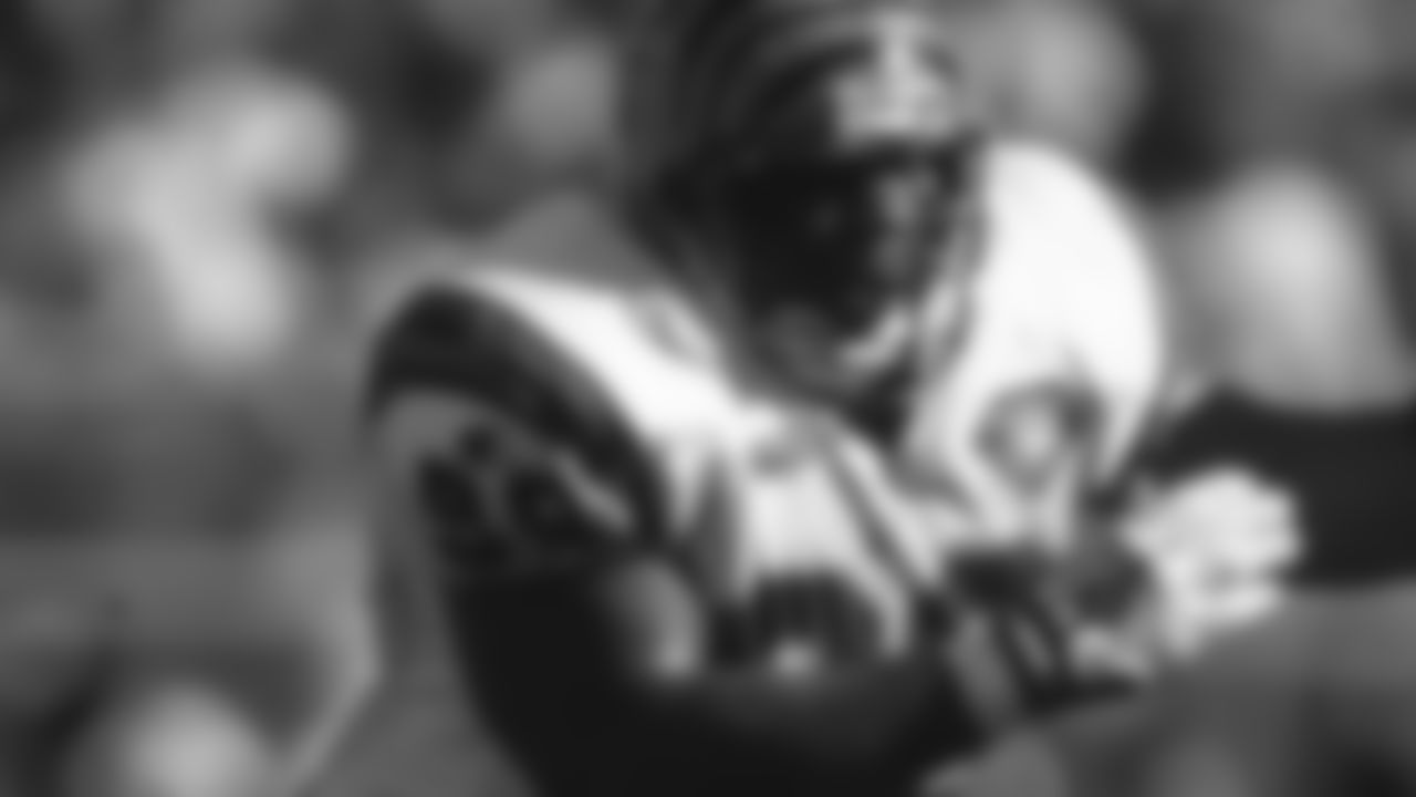 1994: Defensive tackle Dan Wilkinson (99) is seen in action.