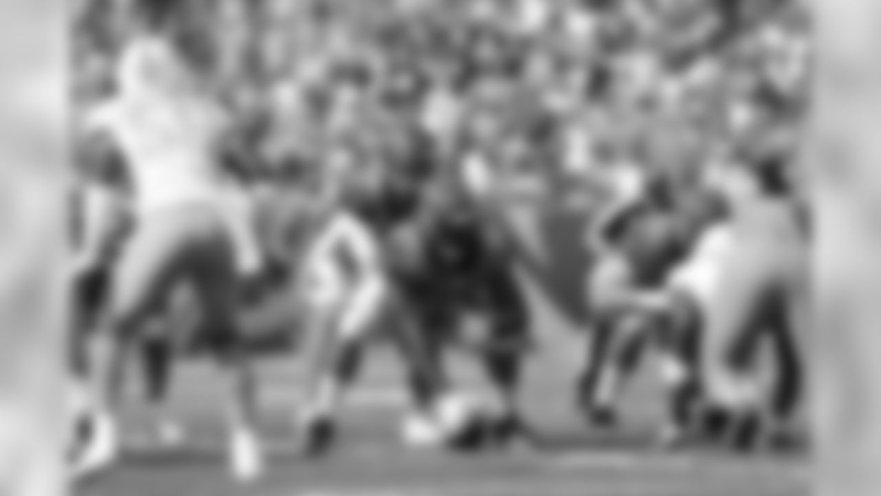 Center Trey Hopkins prepares to snap the ball before the week 5 game against the Miami Dolphins.